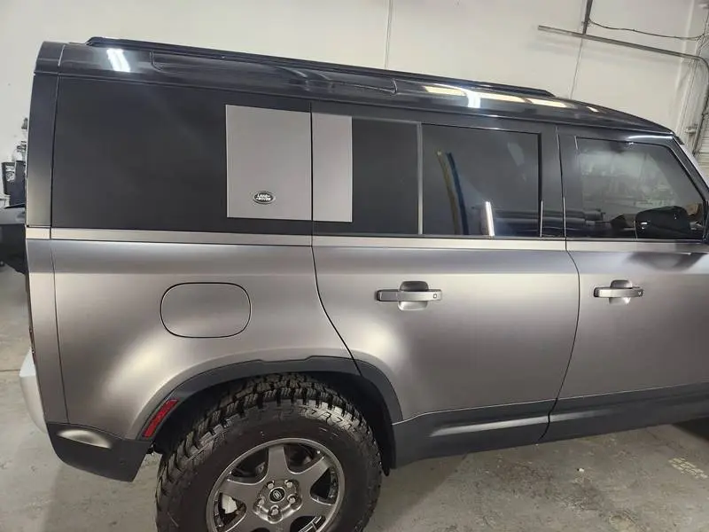 Land Rover with professional window tinting for a bold appearance